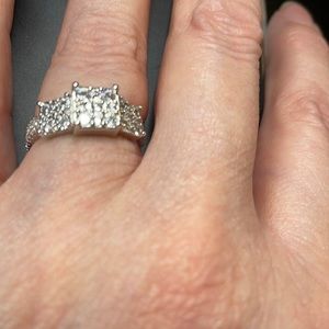 This is a 925 sterling silver ring with all clear stones. Selling as a Fashion